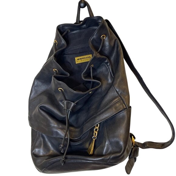 black backpack with brown leather bottom Orlando 16